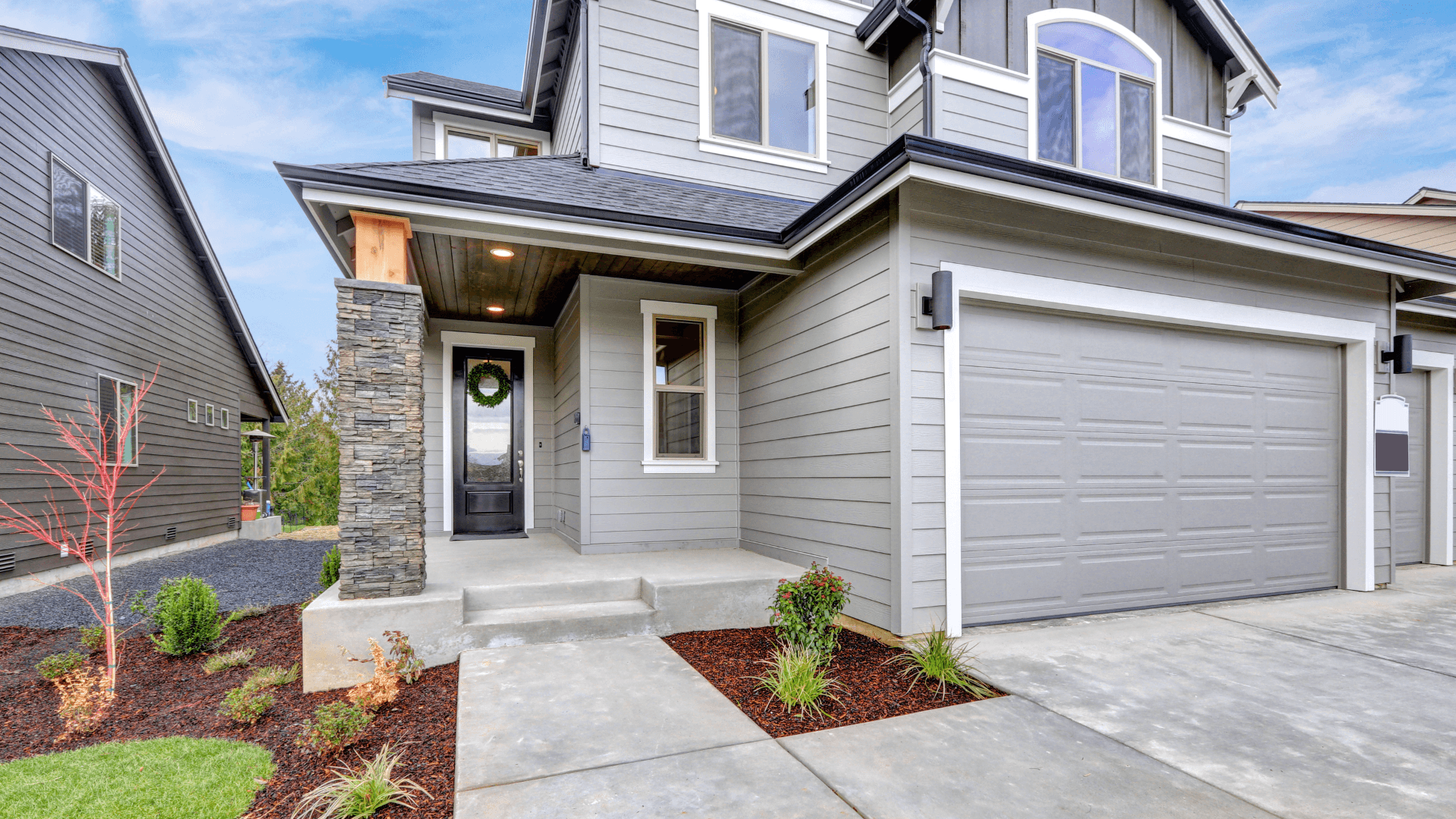 Pre-painted Wood siding on grey home